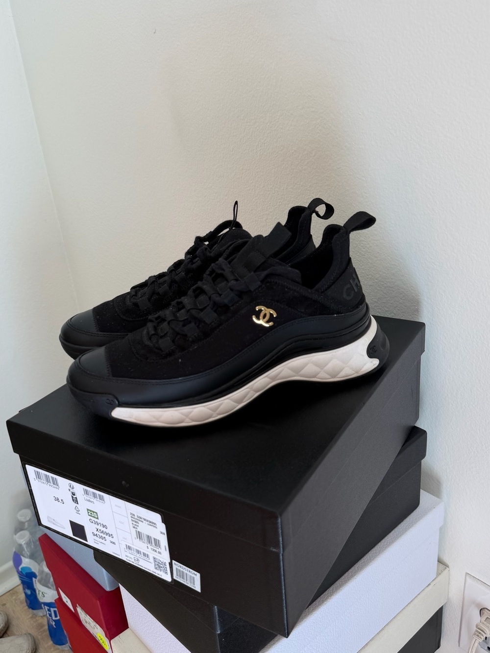 CHANEL Black and White Quilted-Sole Sneakers with Gold CC